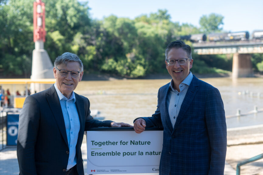 MP Terry Duguid and MHC CEO Stephen Carlyle pose together at an event at the Forks